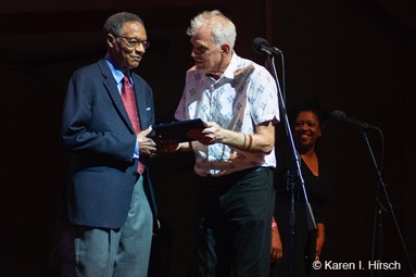 Mark Kelly, Commissioner of Chicago Department of Cultural Affairs presents Ramsey Lewis with proclamation